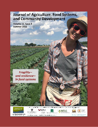 JAFSCD cover with famer Julia Slocum in her field at Lacewing Acres in Ames, Iowa, USA